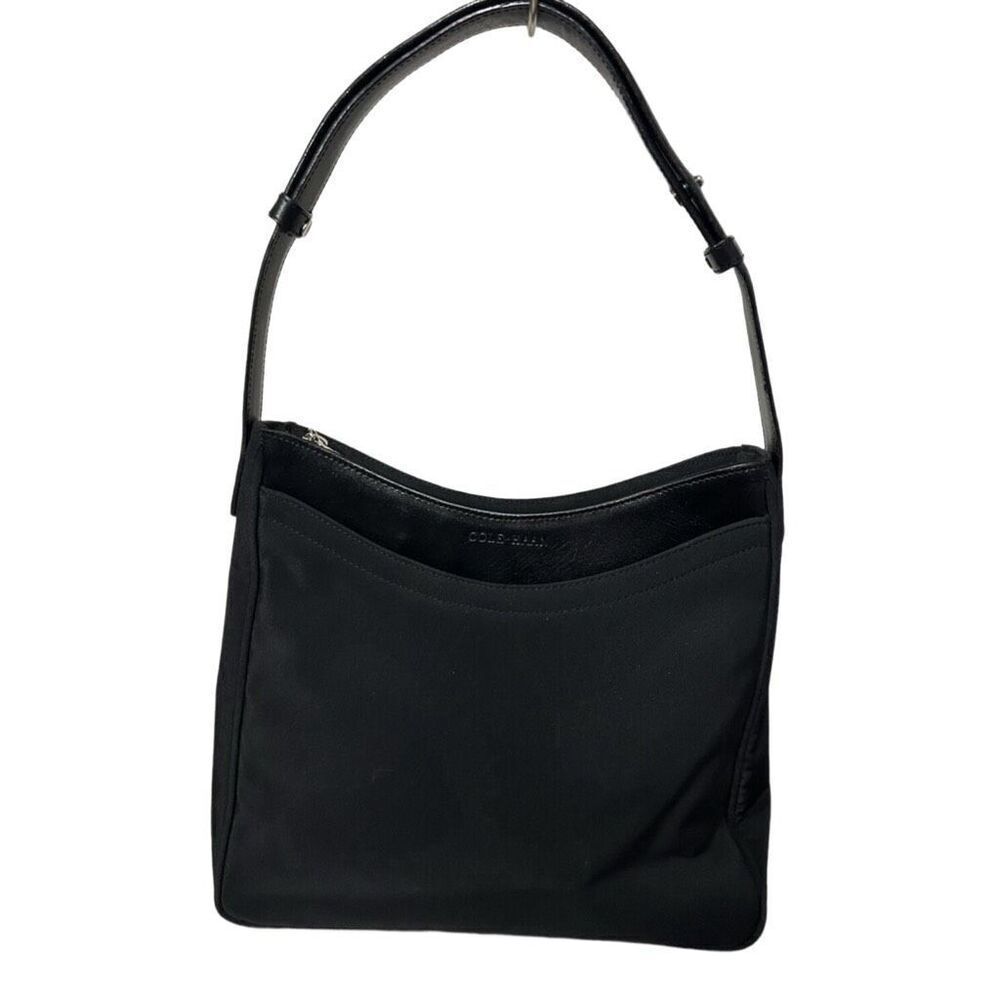 Cole Haan collaborate with Estee’ Lauder shoulder bag.